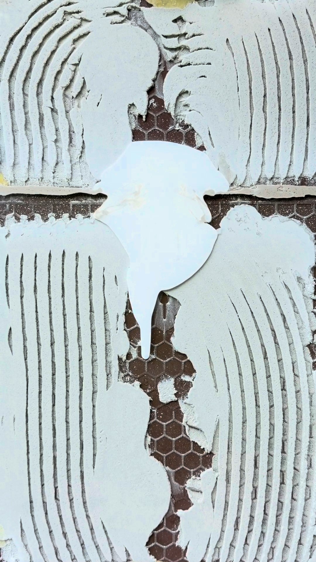Stone Science hollow and loose floor injection adhesive on tile